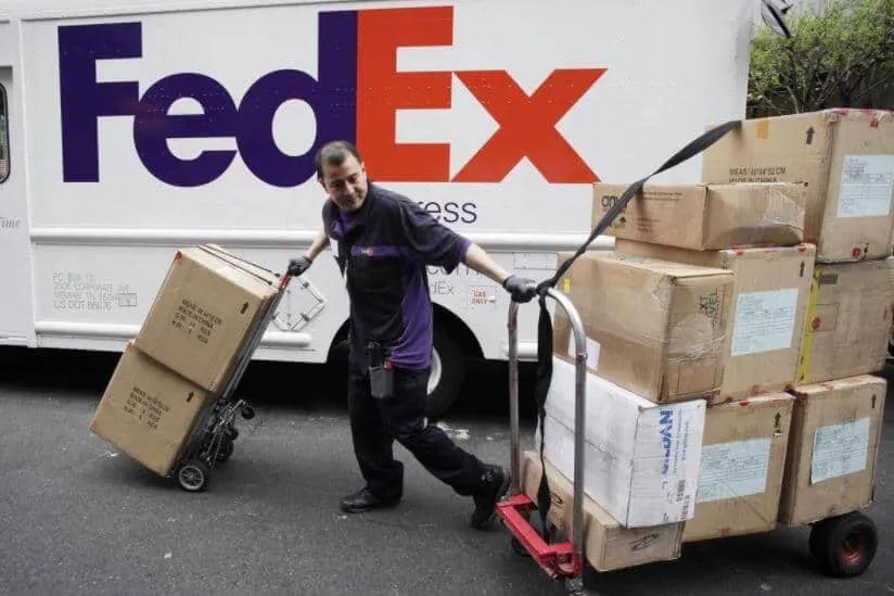 man scheduling fedex express packages