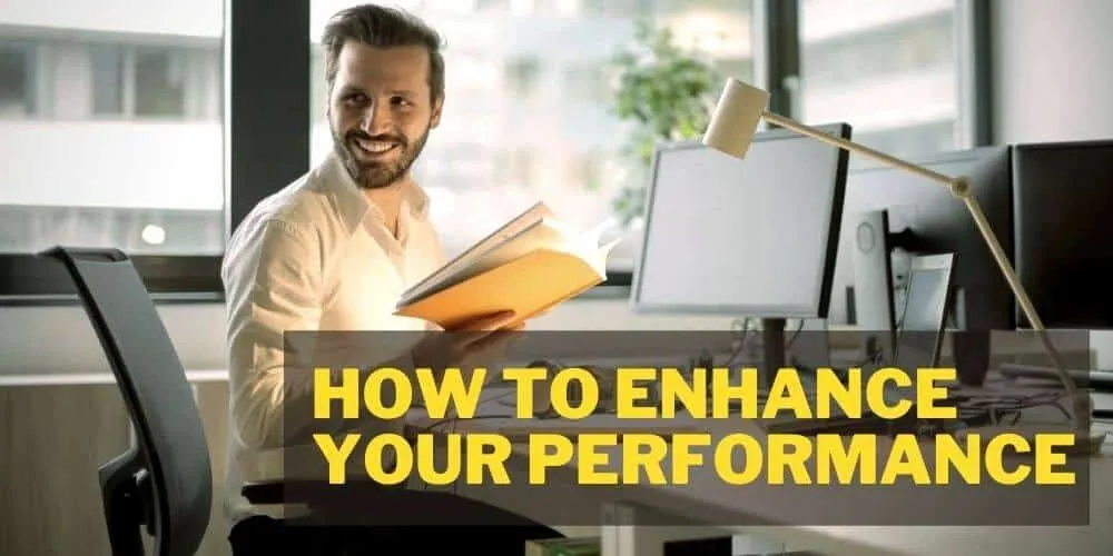 A happy man is preparing from a book to enhance the performance